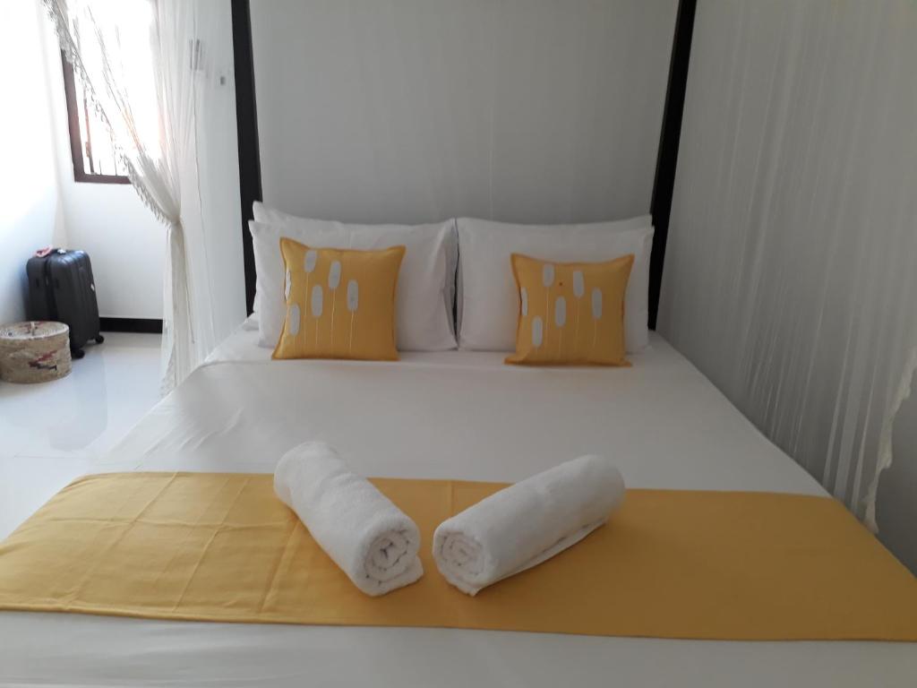 Postel nebo postele na pokoji v ubytování Apna Homestay Apartments