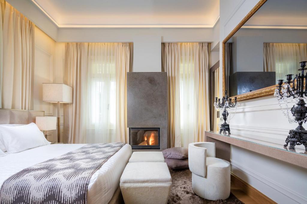 Postel nebo postele na pokoji v ubytování 3 Sixty Hotel & Suites