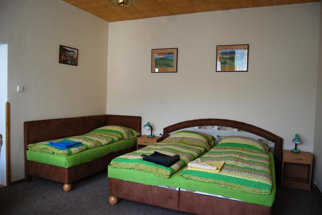 Postel nebo postele na pokoji v ubytování Alexandra