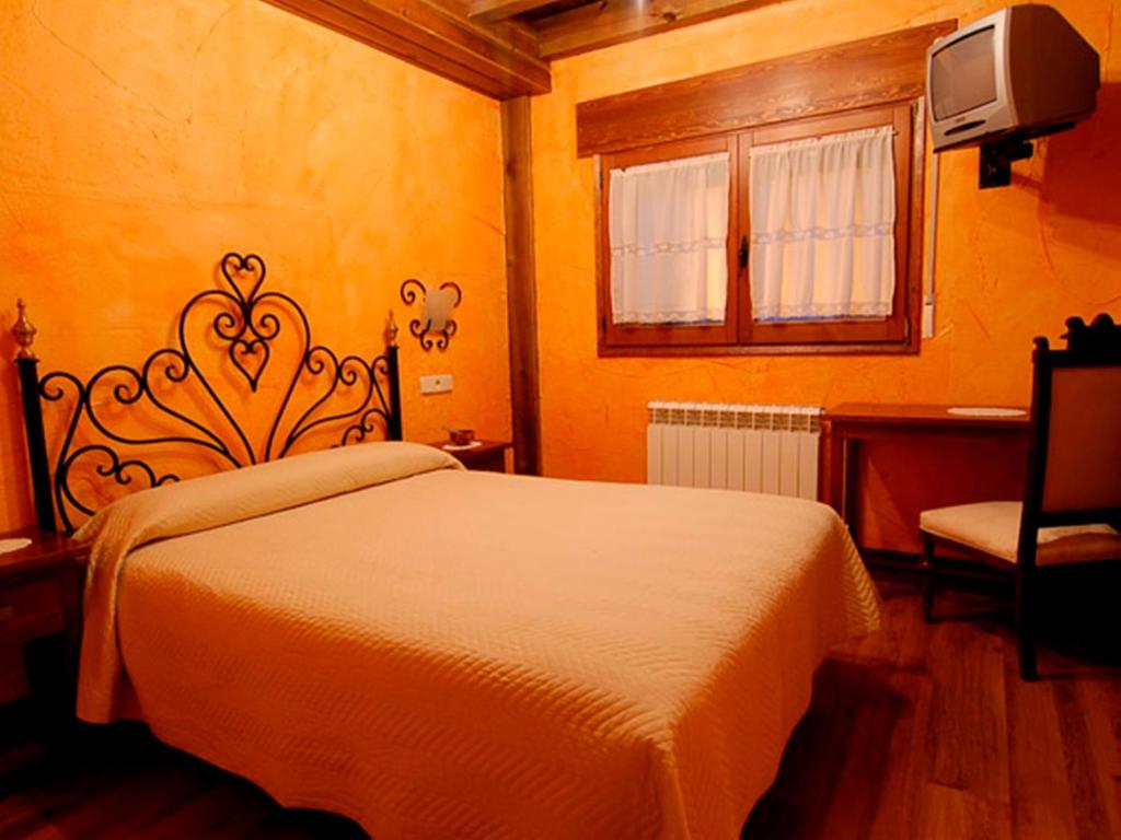 Posteľ alebo postele v izbe v ubytovaní La Casona del Herrero