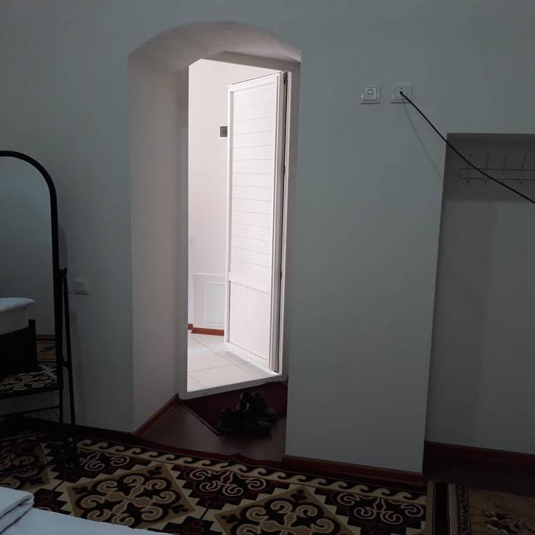 Postel nebo postele na pokoji v ubytování Azimut
