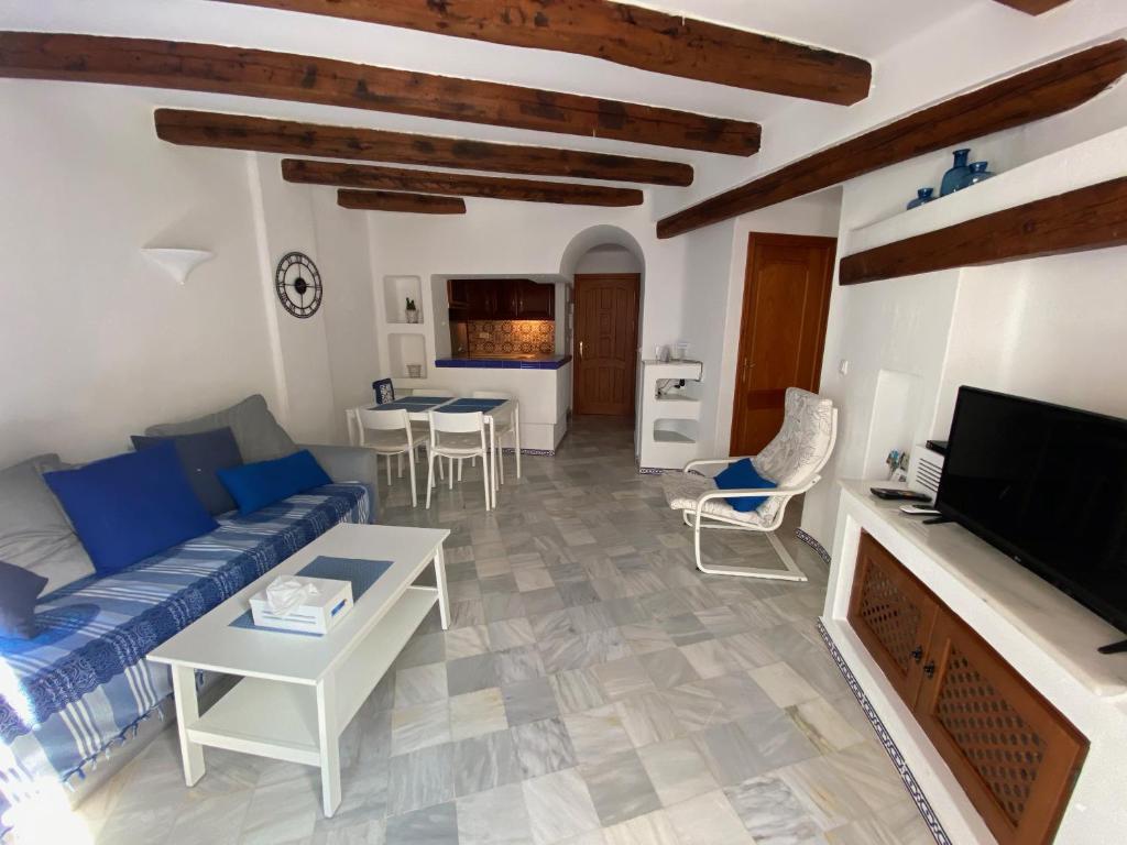 Televízia a/alebo spoločenská miestnosť v ubytovaní Apartamento Tranquilo, Aldea del Mar