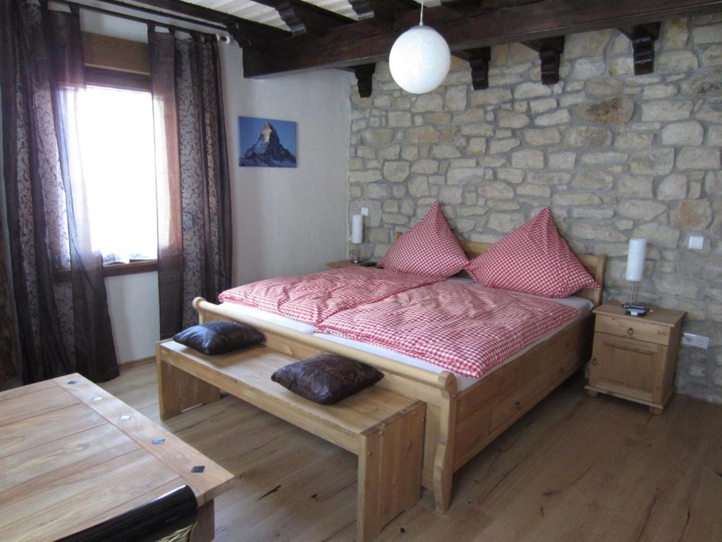Postel nebo postele na pokoji v ubytování Cleo´s Hotel Kallstadt