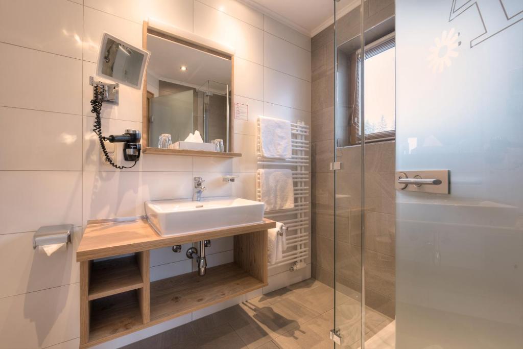 Koupelna v ubytování Aparthotel Acksteiner