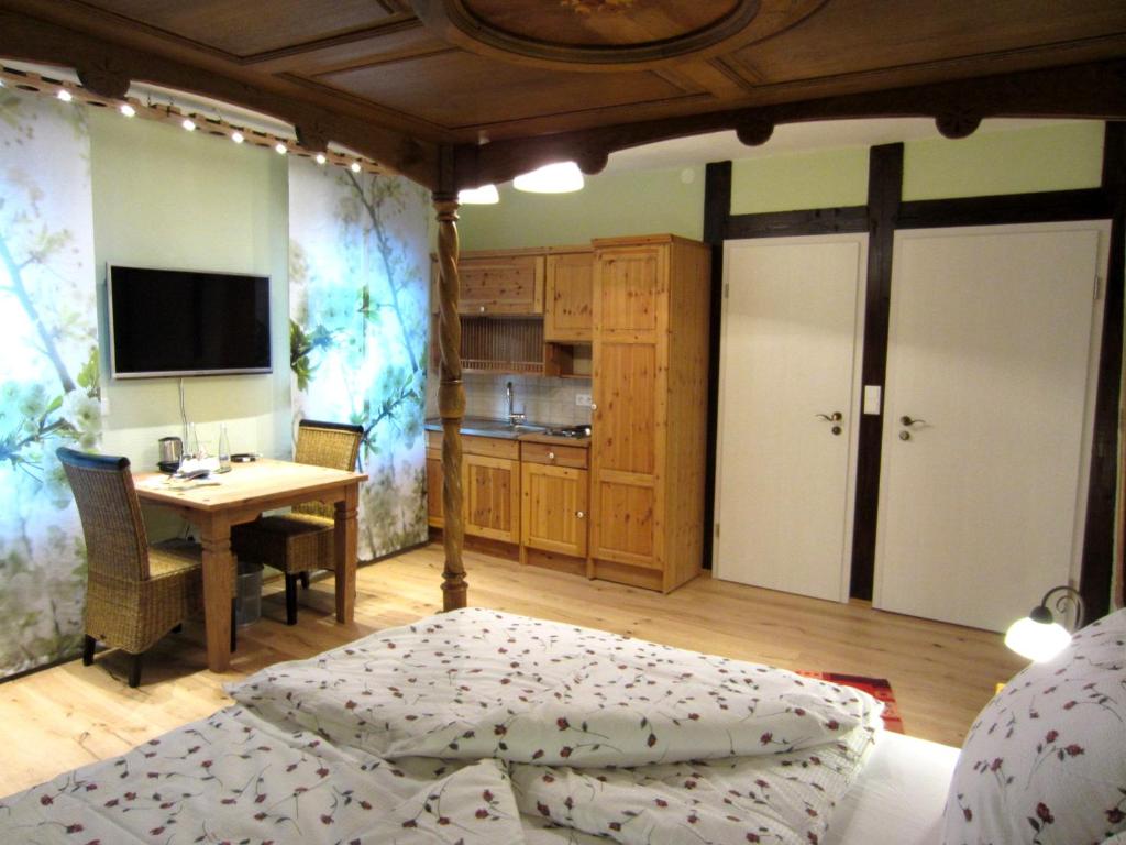 Kuchyň nebo kuchyňský kout v ubytování Cleo´s Hotel Kallstadt