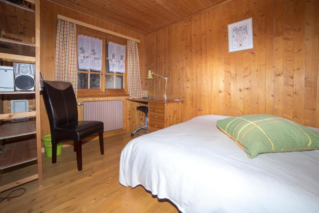 Postel nebo postele na pokoji v ubytování le castor