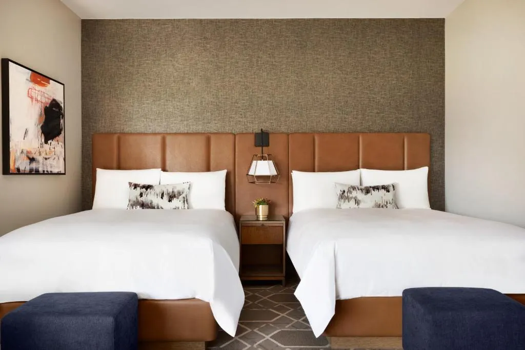 Deluxe Queen Room with Two Queen Beds and Patio or Balcony - Pool View