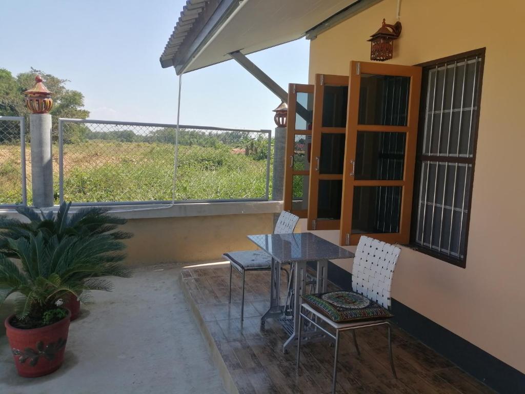 Balkón nebo terasa v ubytování Yotin Guest House