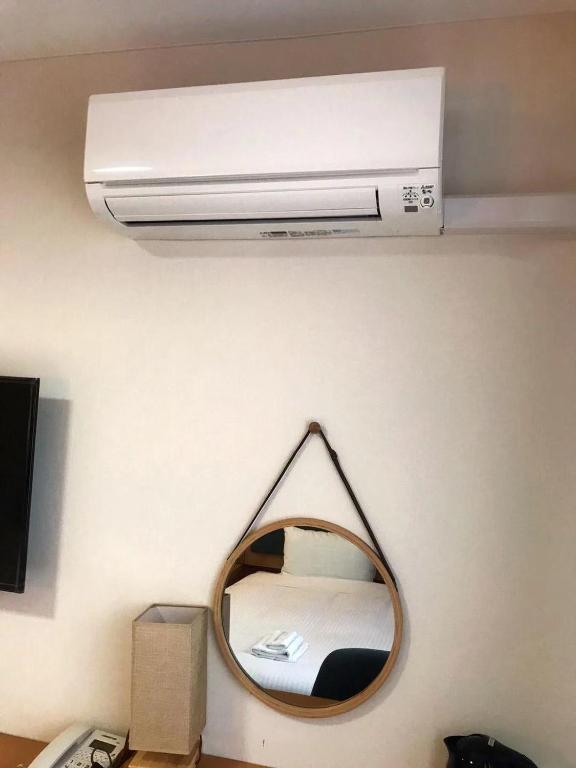 TV a/nebo společenská místnost v ubytování Fujinomori Hotel