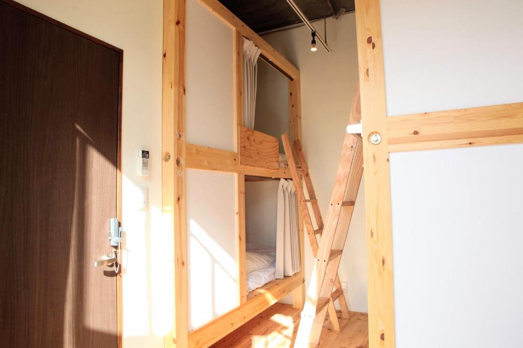 Palanda nebo palandy na pokoji v ubytování 14 Guesthouse Mt.Fuji