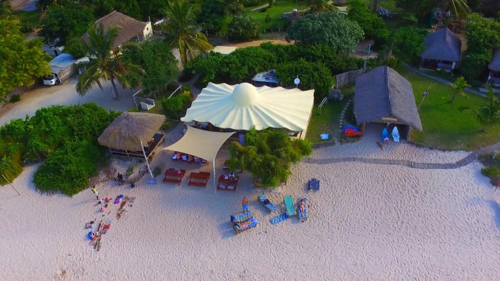 an overhead view of a beach with chairs and umbrellas at Casa Cabana Beach in Vilanculos