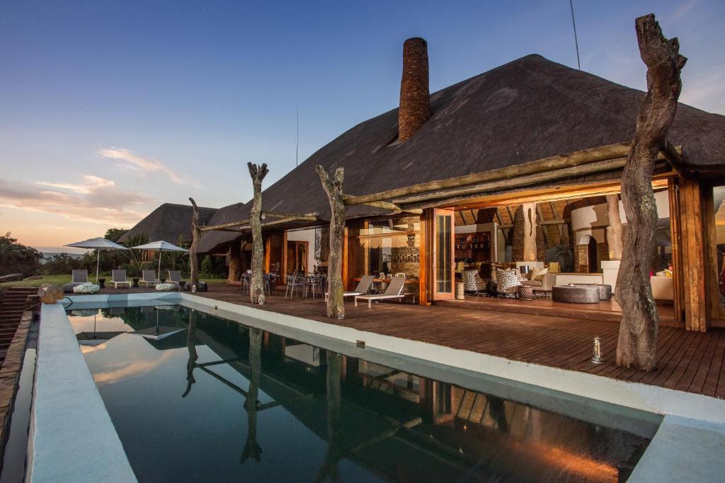 an image of a villa with a swimming pool at Tala Collection Game Reserve, by Dream Resorts in Silverton