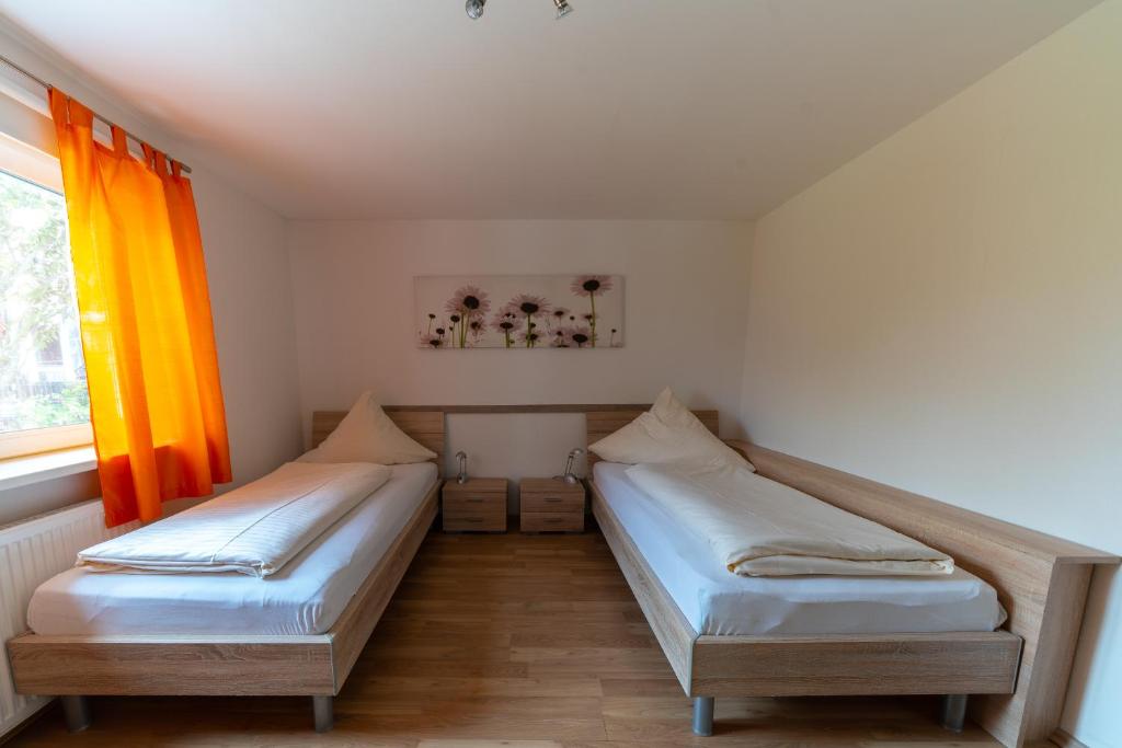 Postel nebo postele na pokoji v ubytování Sonnenhof