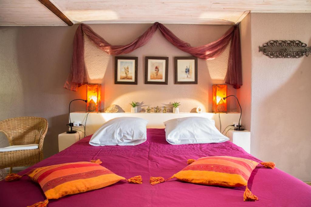 Postel nebo postele na pokoji v ubytování Maison d'hôtes L'îlot bambou