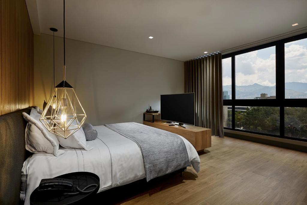 Postel nebo postele na pokoji v ubytování 14 Urban Hotel