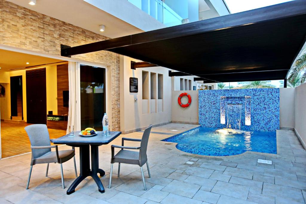 Bazén v ubytování Simaisma A Murwab Resort nebo v jeho okolí