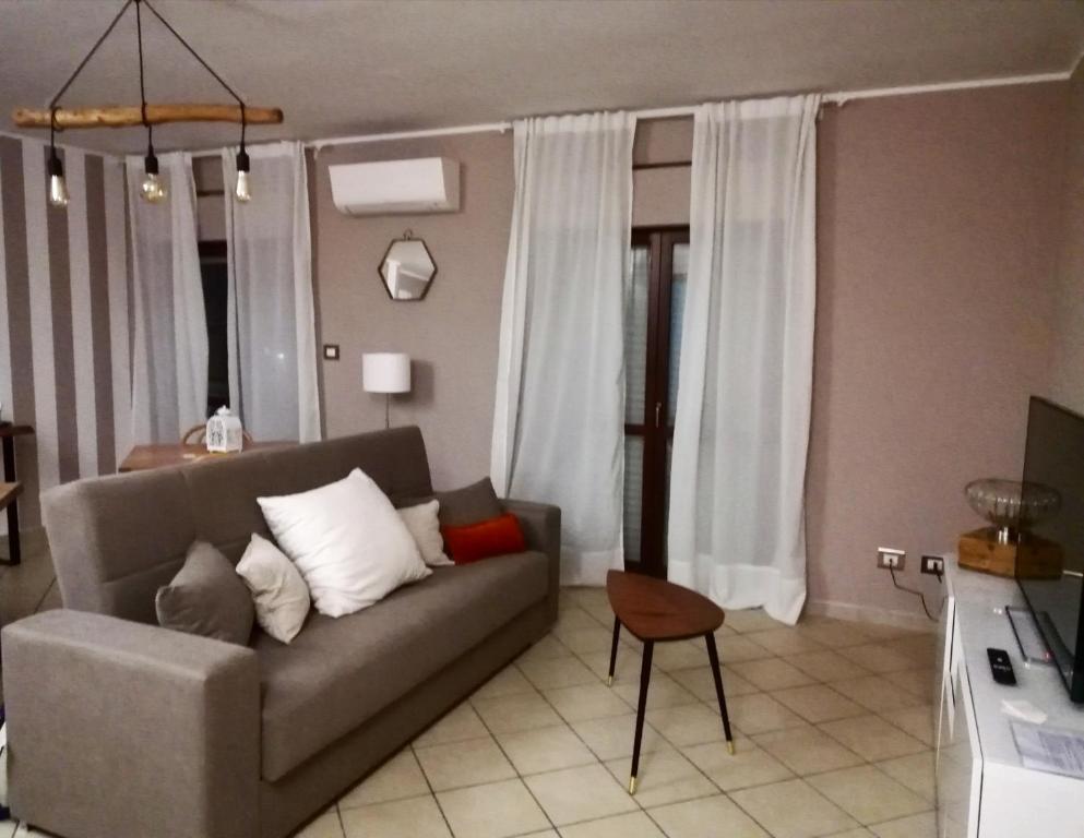 Televízia a/alebo spoločenská miestnosť v ubytovaní B&B Capuam Vetere Accommodation
