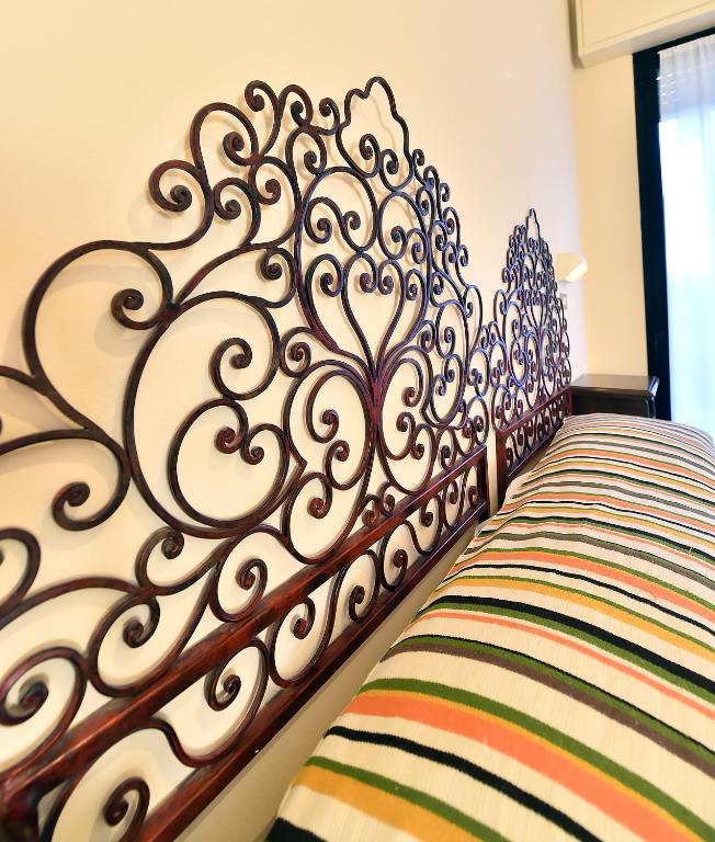 Łóżko lub łóżka w pokoju w obiekcie Hotel Doria