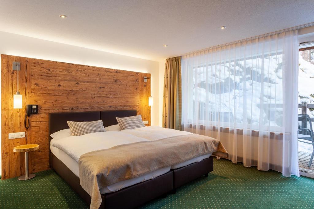 Postel nebo postele na pokoji v ubytování Hotel Jägerhof