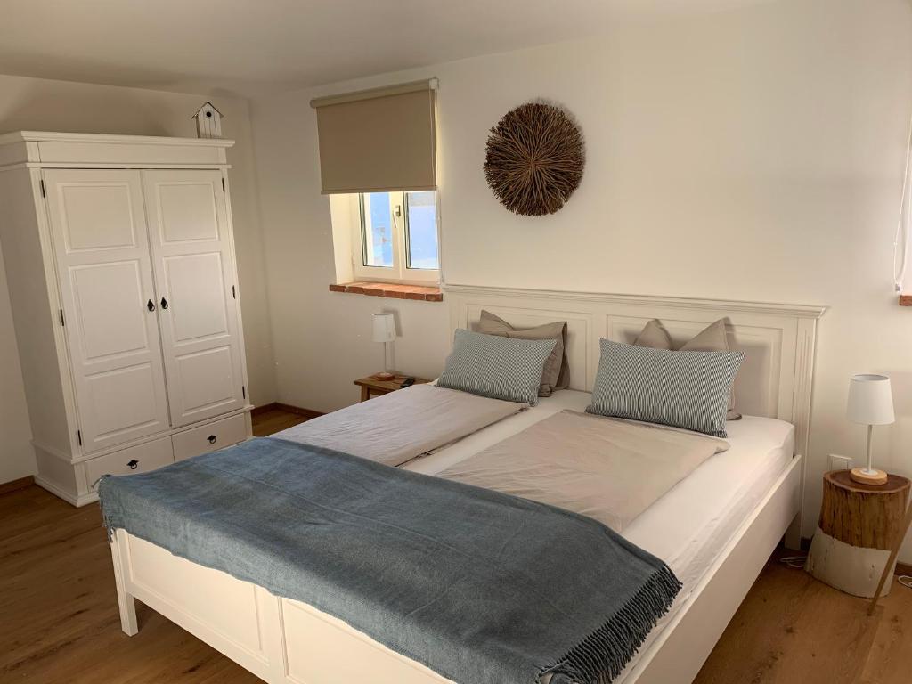 Postel nebo postele na pokoji v ubytování Logis 11 Apartments