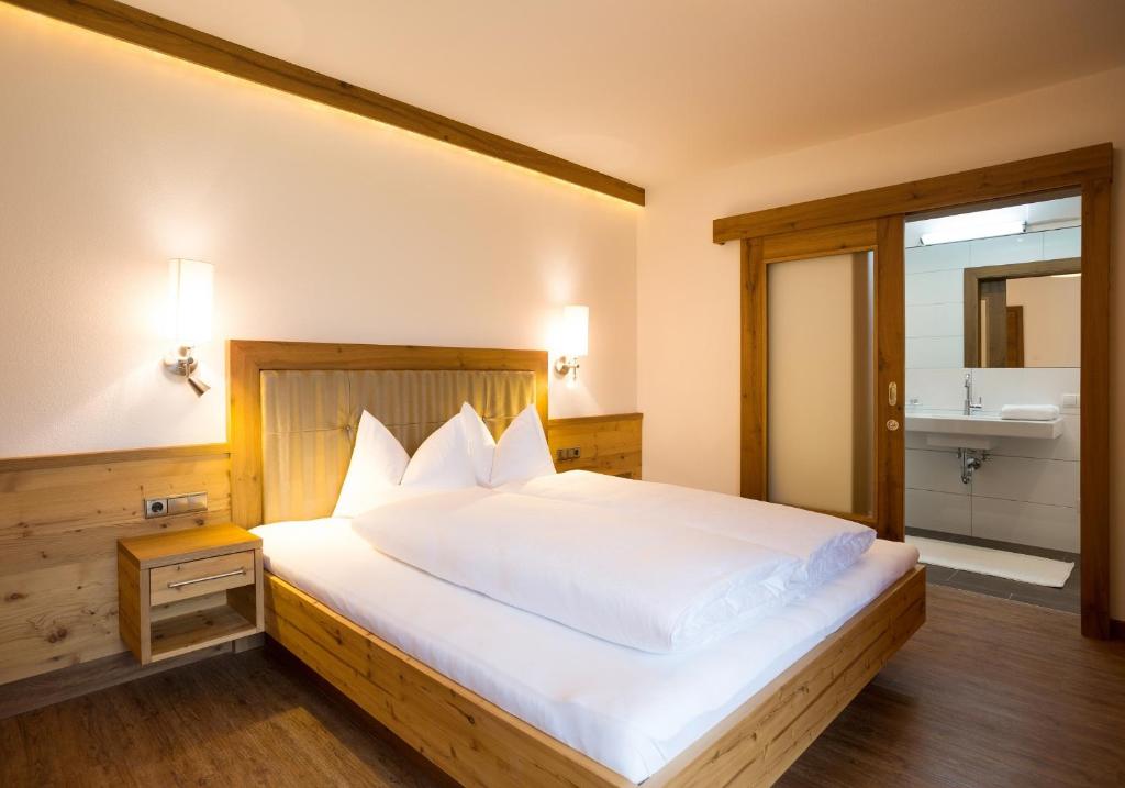 Postel nebo postele na pokoji v ubytování Appartement Freiblick