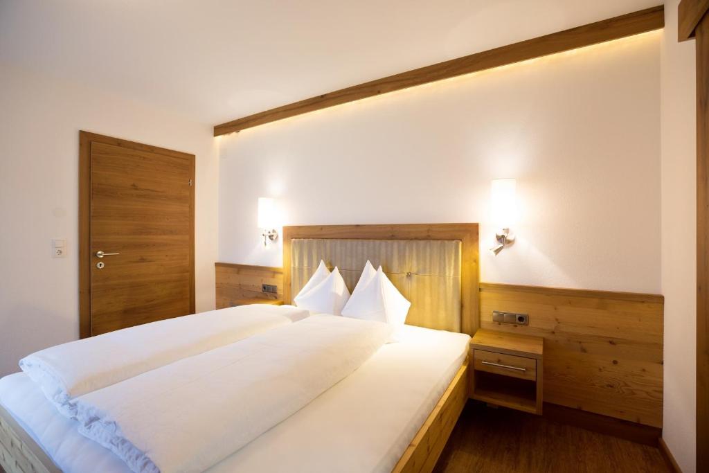 Postel nebo postele na pokoji v ubytování Appartement Freiblick