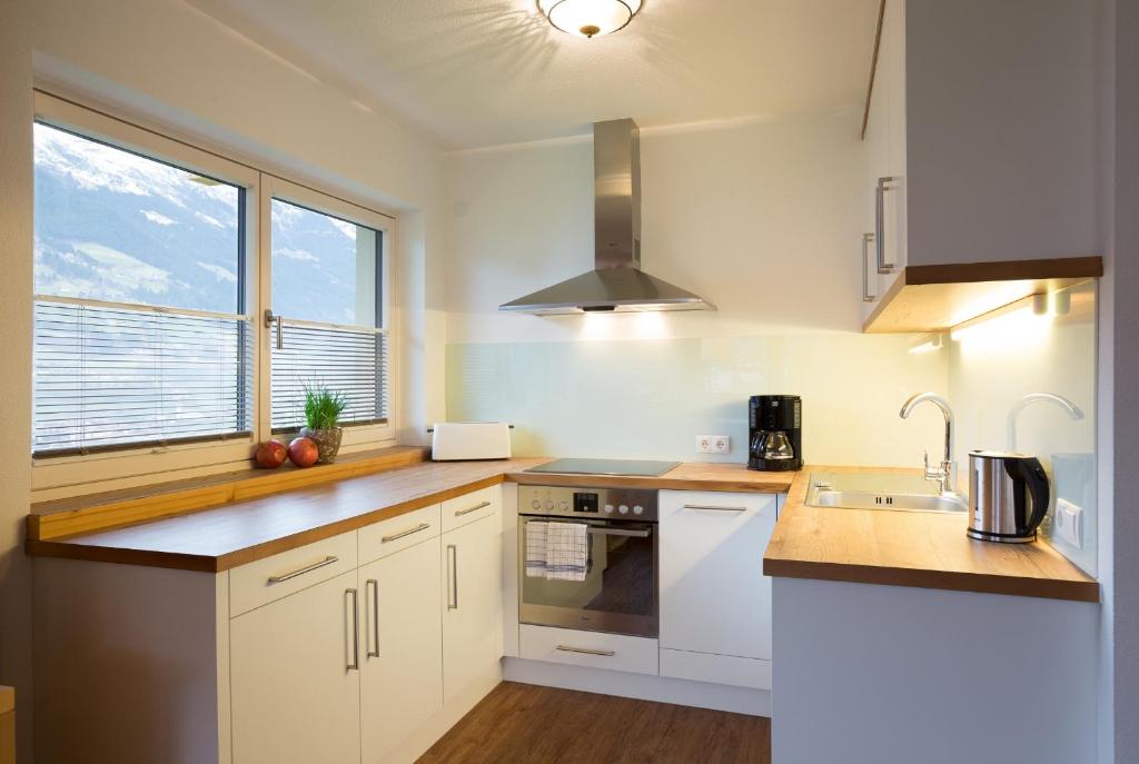 Kuchyň nebo kuchyňský kout v ubytování Appartement Freiblick