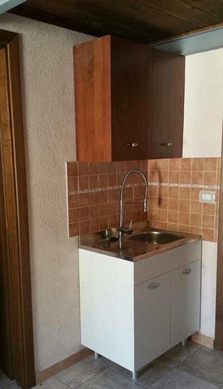 Kuchyň nebo kuchyňský kout v ubytování Hotel Valle del Cedrino