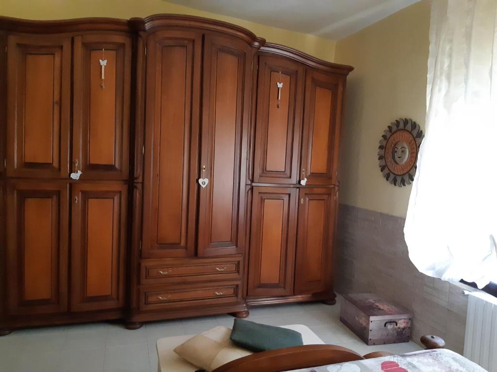 Posteľ alebo postele v izbe v ubytovaní vacanze in sardegna