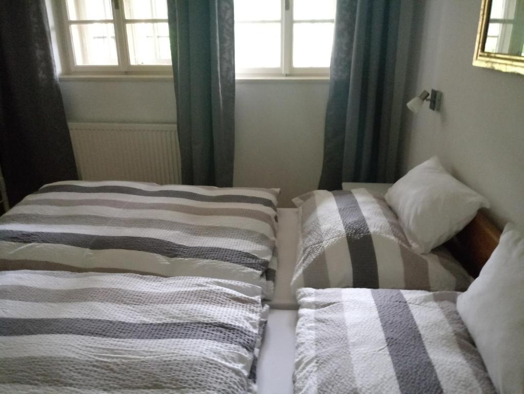 Postel nebo postele na pokoji v ubytování Villa Daheim Semmering
