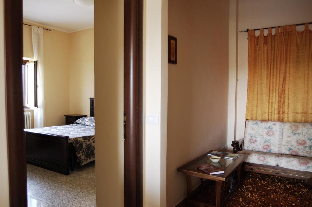 Postel nebo postele na pokoji v ubytování La Staccionata
