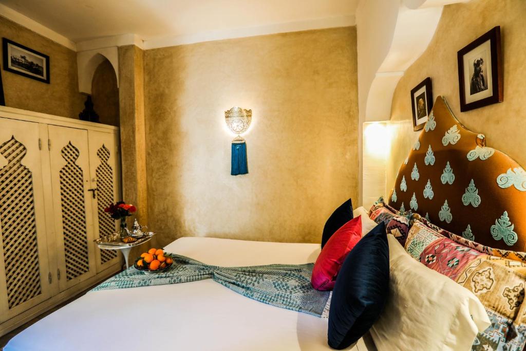 Postel nebo postele na pokoji v ubytování Riad les 2 Portes