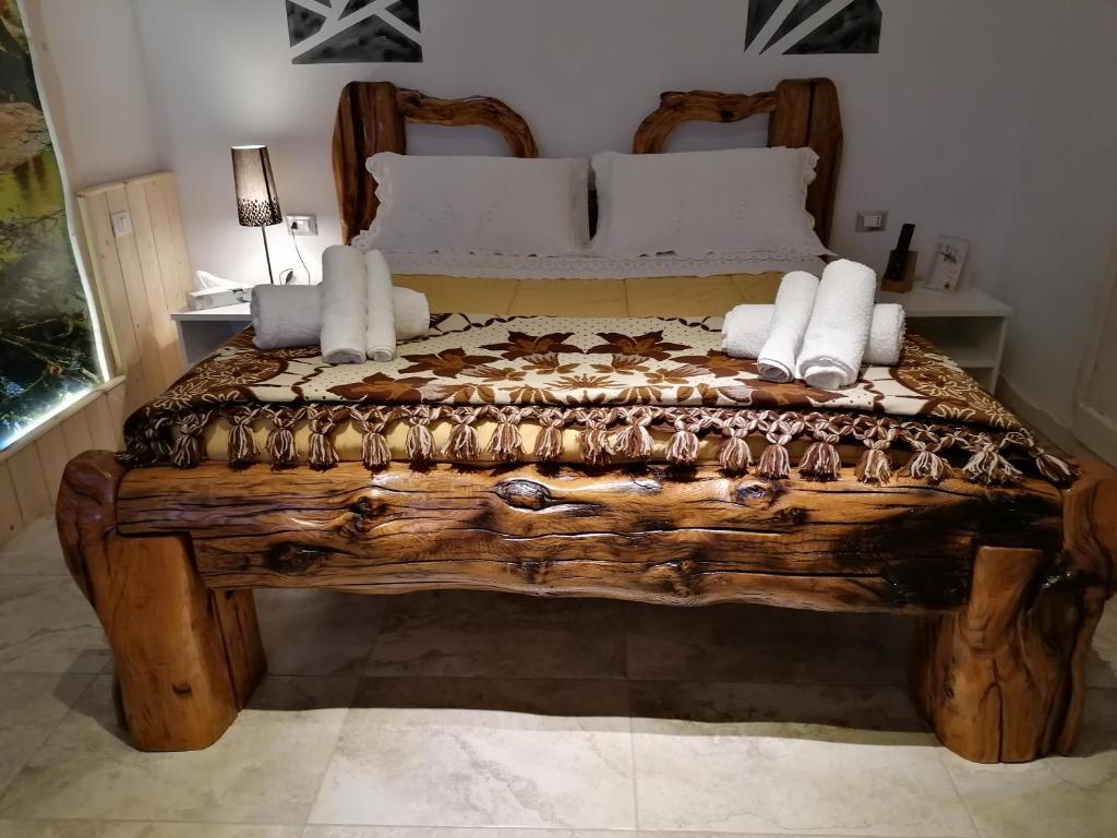 Łóżko lub łóżka w pokoju w obiekcie Villa Sofia-La camera nella Riserva