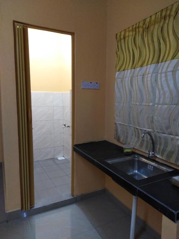 Koupelna v ubytování Homestay Teratak Umi Klang