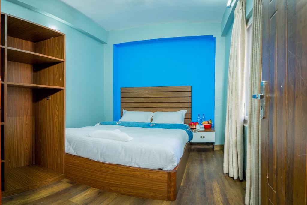 Postel nebo postele na pokoji v ubytování Hotel Nepal Bhumi