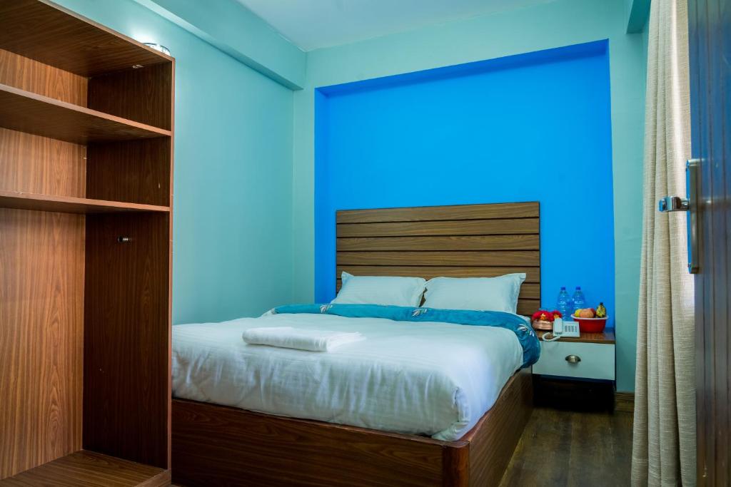 Postel nebo postele na pokoji v ubytování Hotel Nepal Bhumi