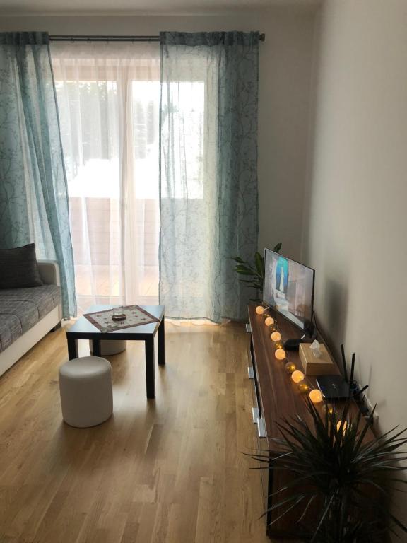 TV a/nebo společenská místnost v ubytování Apartmán Jitka - Slunečná louka