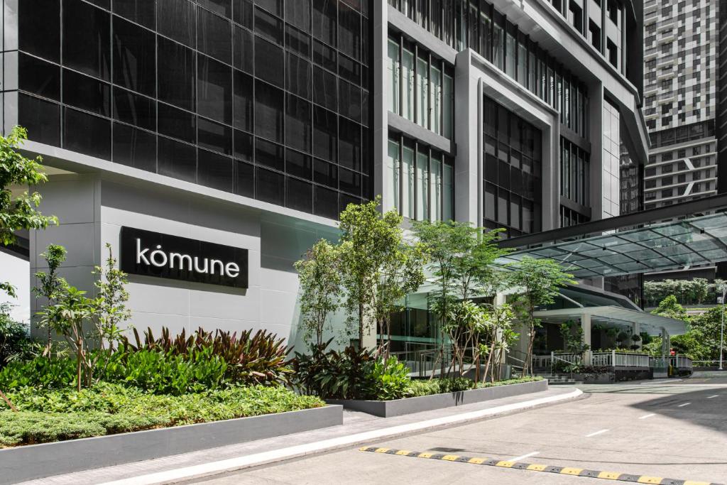 a building with a klaminders sign on it at Komune Living in Kuala Lumpur