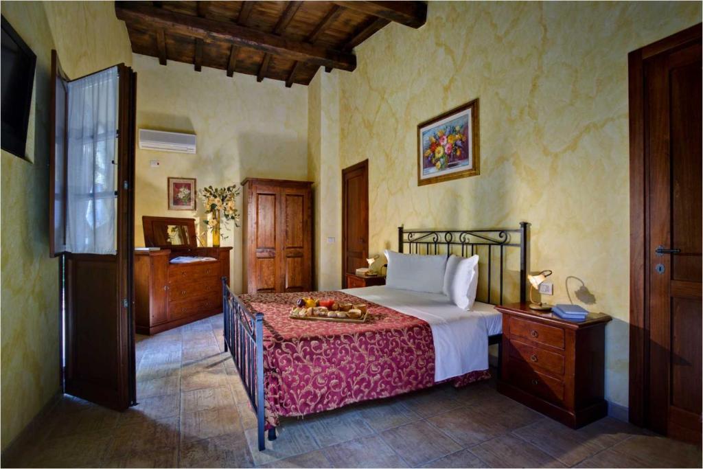 Posteľ alebo postele v izbe v ubytovaní Villa Hotel Valle Del Marta Resort