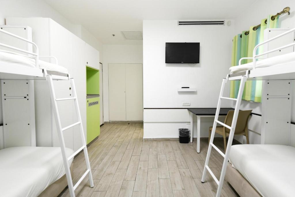 Postel nebo postele na pokoji v ubytování HI - Bnei Dan - Tel Aviv Hostel