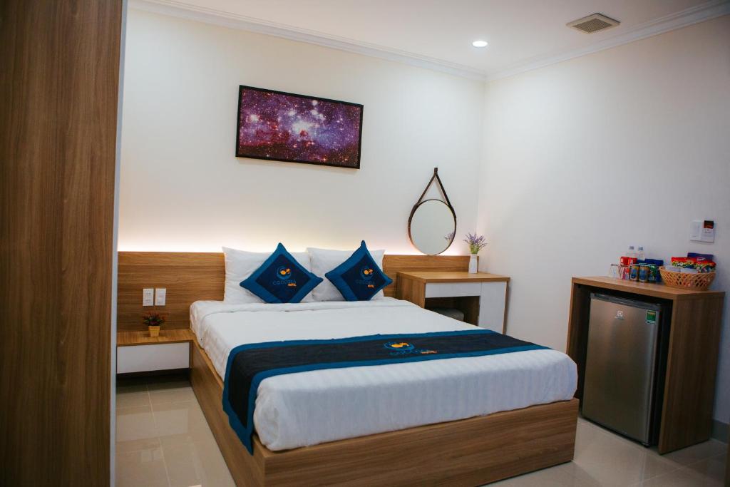 Postel nebo postele na pokoji v ubytování COCOSEA HOTEL