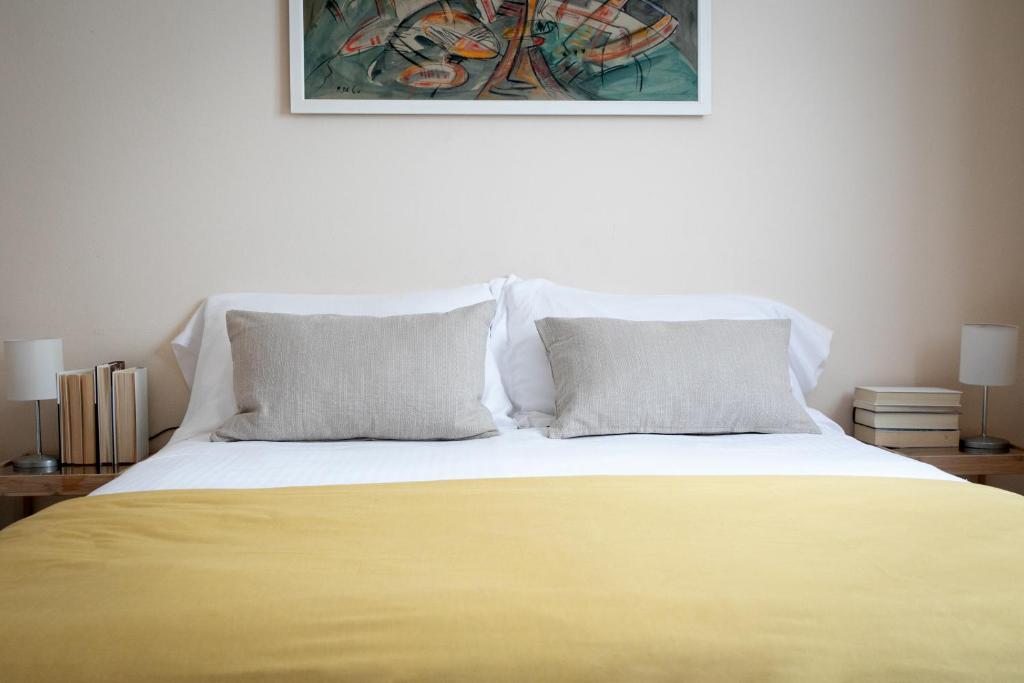Postel nebo postele na pokoji v ubytování IseoLakeRental - Casa Anita