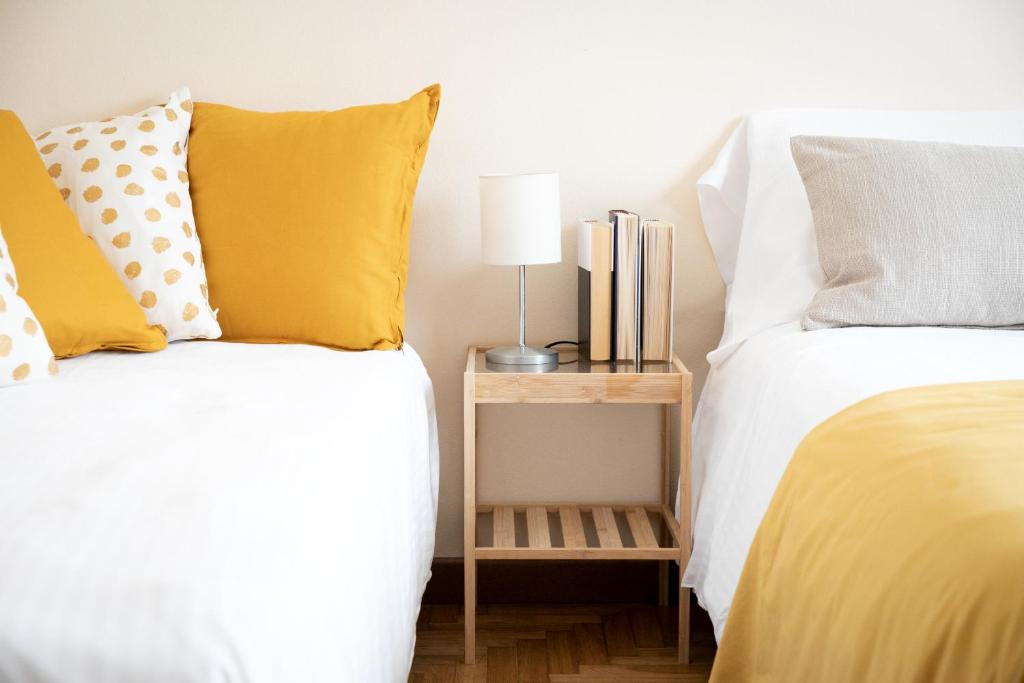 Postel nebo postele na pokoji v ubytování IseoLakeRental - Casa Anita