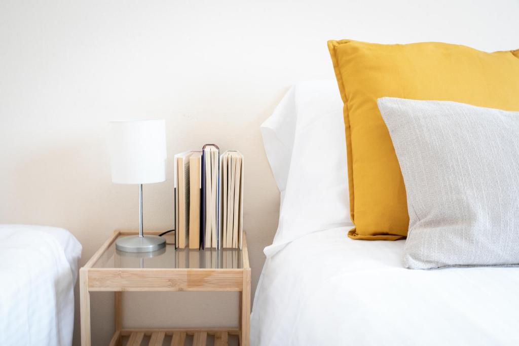 Postel nebo postele na pokoji v ubytování IseoLakeRental - Casa Anita