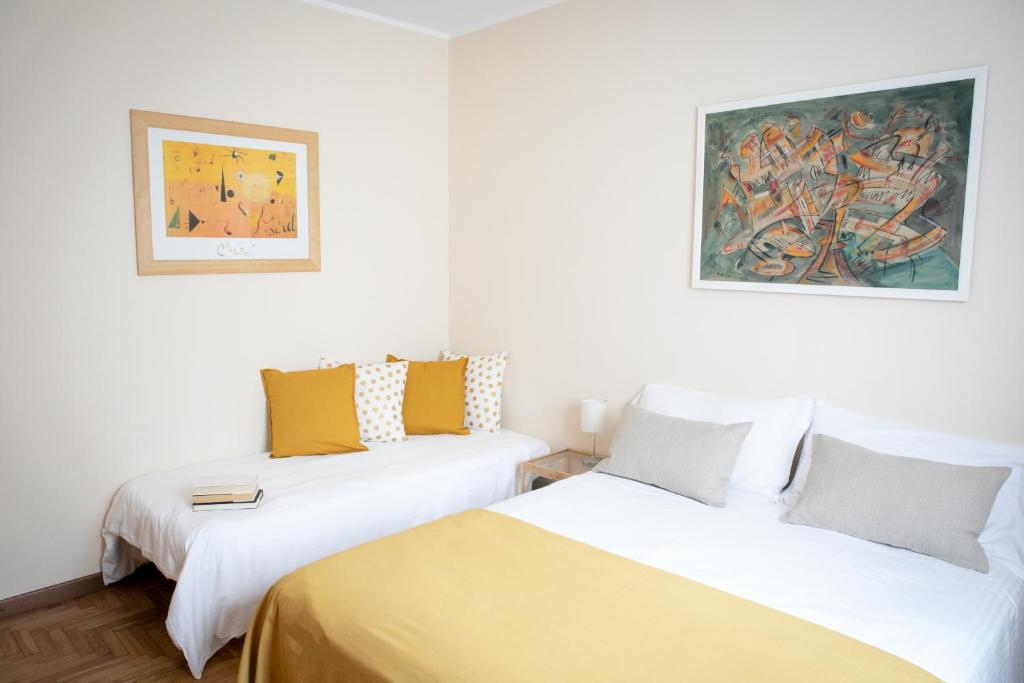 Postel nebo postele na pokoji v ubytování IseoLakeRental - Casa Anita