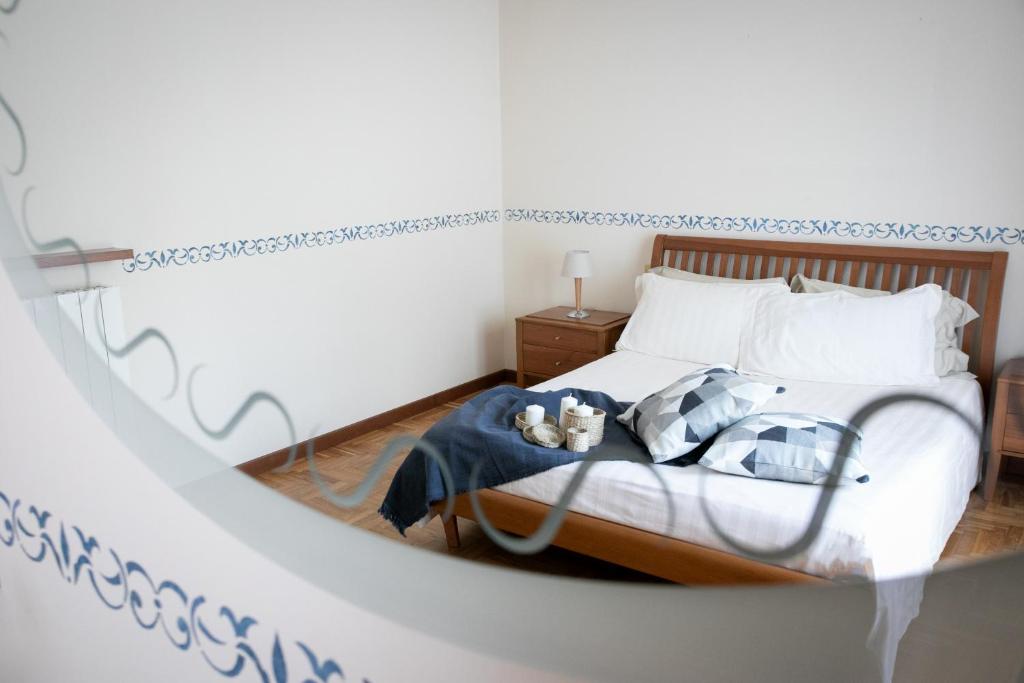 Postel nebo postele na pokoji v ubytování IseoLakeRental - Casa Anita