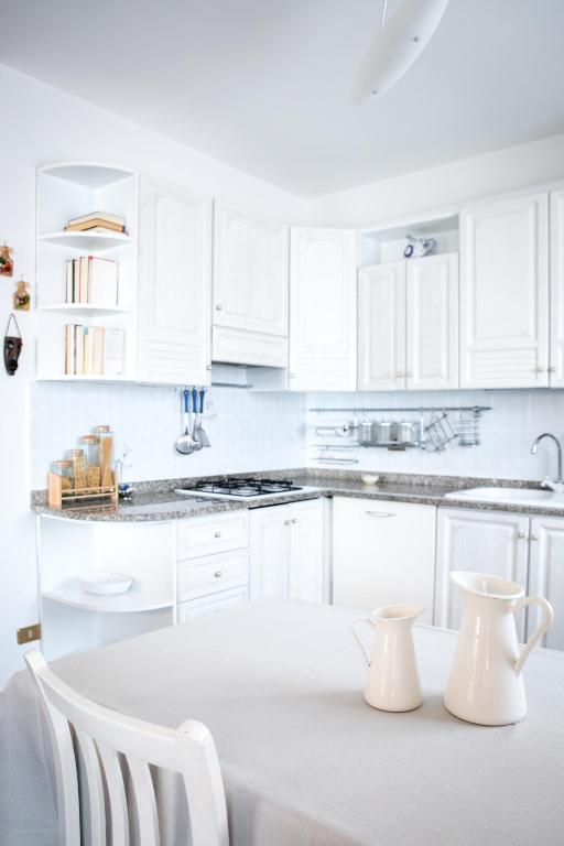 Kuchyň nebo kuchyňský kout v ubytování IseoLakeRental - Casa Anita