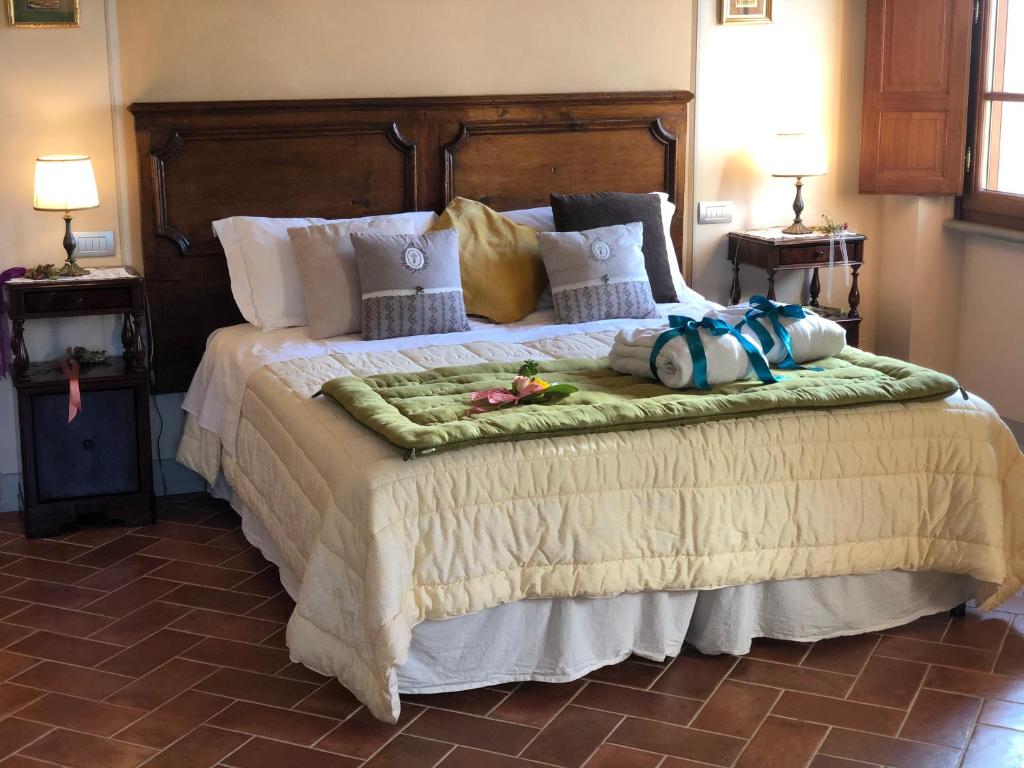 Posteľ alebo postele v izbe v ubytovaní La Cantina Relais - Fattoria Il Cipresso