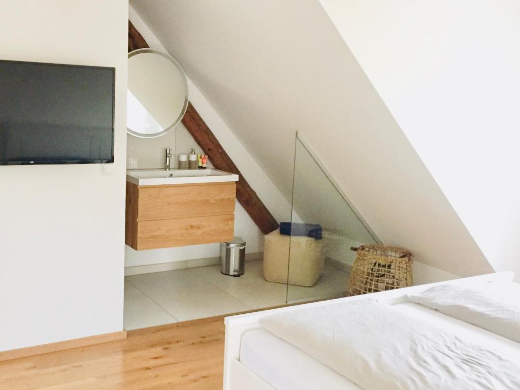 TV a/nebo společenská místnost v ubytování Logis 11 Apartments