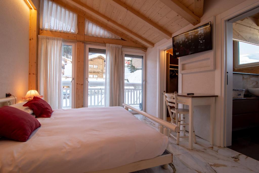 Postel nebo postele na pokoji v ubytování Villa Claudia
